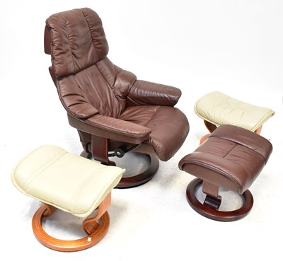 Lot 13 - A Stressless brown leather reclining armchair...