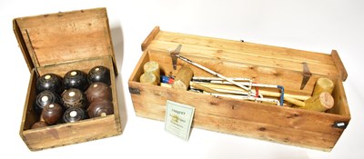 Lot 257 - A croquet set in a wooden box and a box...