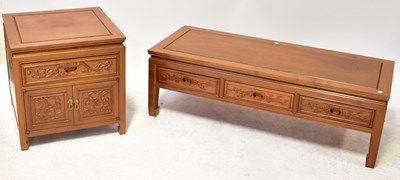 Lot 179 - A Chinese hardwood coffee table with carved...