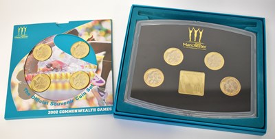 Lot 634 - THE ROYAL MINT; two 2002 Manchester...