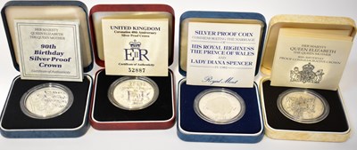 Lot 651 - THE ROYAL MINT; four silver proof crown coins...