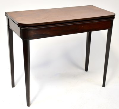 Lot 89 - A George III mahogany fold-over tea table, on...