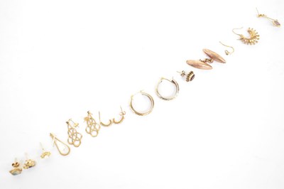 Lot 722 - Three pairs of 9ct gold earrings comprising a...