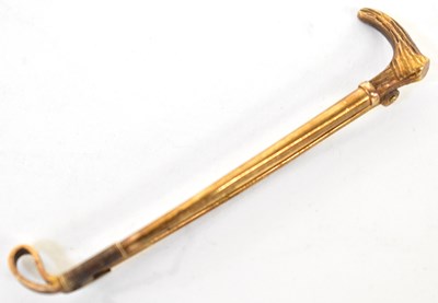 Lot 704 - A 9ct gold bar brooch in the form of a riding...