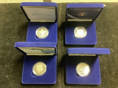 Lot 649 - THE ROYAL MINT; four silver proof crowns...