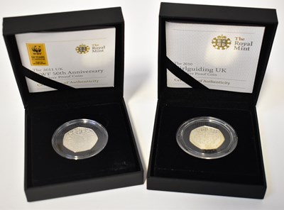 Lot 623 - THE ROYAL MINT; two silver proof 50p coins,...