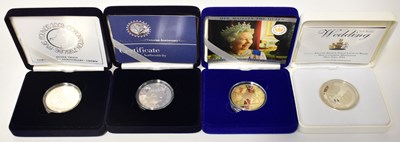 Lot 647 - THE ROYAL MINT; four silver proof coins, The...