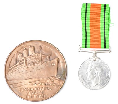 Lot 405 - A bronze medal commemorating the maiden voyage...