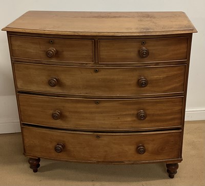 Lot 471 - A mahogany bowfronted chest of two short over...