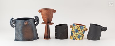 Lot 480 - PAUL TAYLOR; a group of smoke fired terracotta...