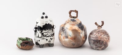 Lot 70 - CABBY LUXFORD; a faceted smoke fired...