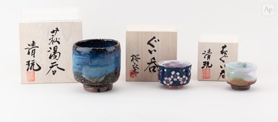 Lot 586 - SEIGAN YAMANE; a grogged stoneware yunomi...