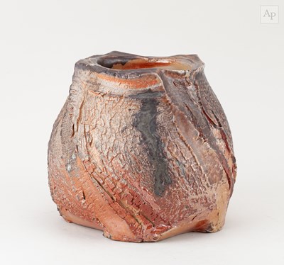 Lot 373 - LINDA DE NIL (born 1959); a faceted wood fired...