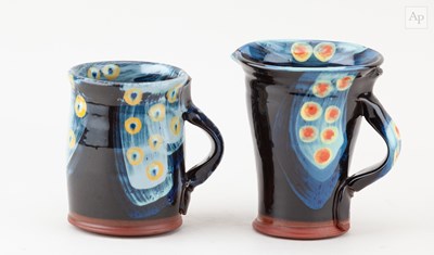 Lot 333 - JOHN POLLEX (born 1941); a slipware jug with...