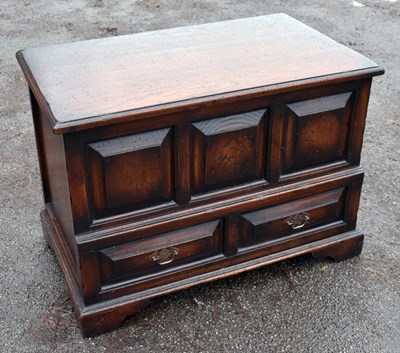 Lot 1734 - A small reproduction oak coffer