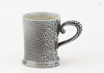 Lot 634 - STEVE HARRISON (born 1967); a salt glazed mug,...