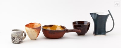 Lot 735 - A group of stoneware and slipware ceramics by...