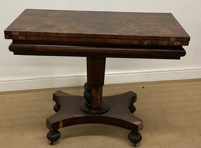 Lot 561 - A 19th century rosewood veneered fold-over tea...