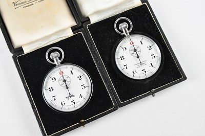 Lot 1584 - Two cased crown wind stopwatches, each fitted...