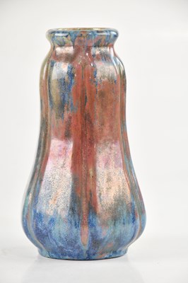 Lot 259 - ROYAL DELFT; an art pottery gourd vase with...