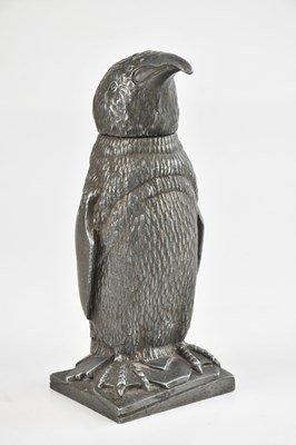 Lot 1411 - A decorative silvered table lighter formed as...