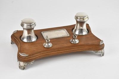Lot 89 - A modern hallmarked silver mounted walnut desk...