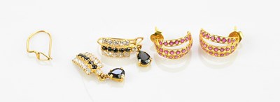 Lot 243 - A pair of Indian yellow metal earrings with...