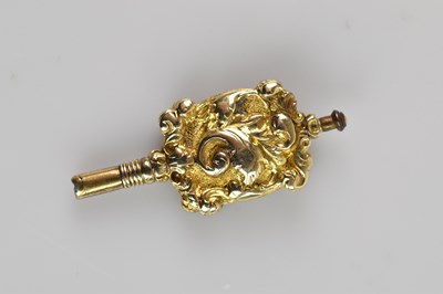 Lot 30 - A yellow metal mounted pocket watch key with...