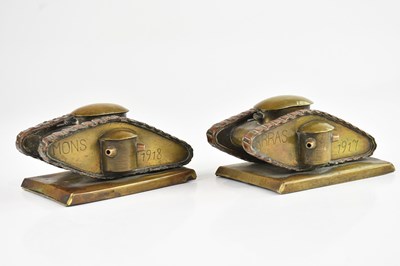 Lot 466 - A pair of trench art copper and brass tanks,...