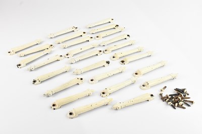Lot 1414 - A collection of Victorian iron stair rods/clips.