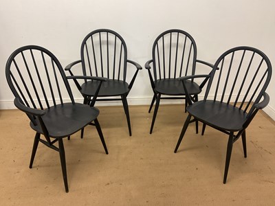 Lot 452 - ERCOL; four Windsor carver armchairs in...