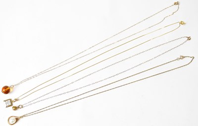 Lot 715 - Four 9ct gold pendant necklaces comprising a...