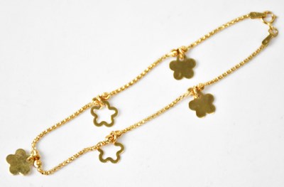 Lot 700 - An 18ct gold chain bracelet, set with flower...