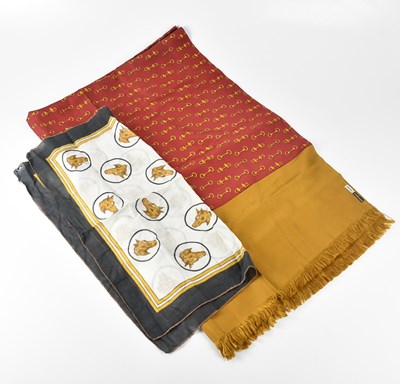Lot 1202 - HERMÈS; a 100% silk fringed scarf depicting...