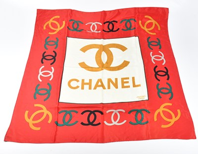 Lot 1183 - CHANEL; a 100% silk twill red, gold and green...