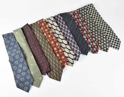 Lot 1236 - HERMÈS; a khaki green vintage 100% silk tie...