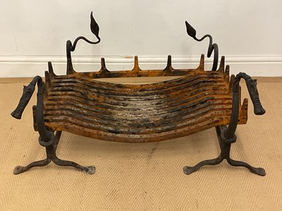 Lot 99 - A cast iron fire grate, together with a pair...