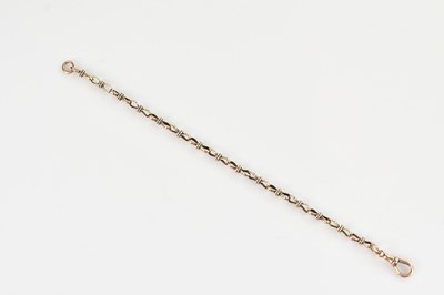 Lot 121 - A yellow metal fancy link bracelet, length...