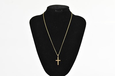 Lot 370 - A 9ct yellow gold cross pendant, suspended on...