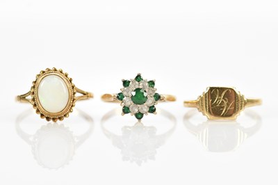 Lot 628 - Three 9ct yellow gold rings, comprising a...