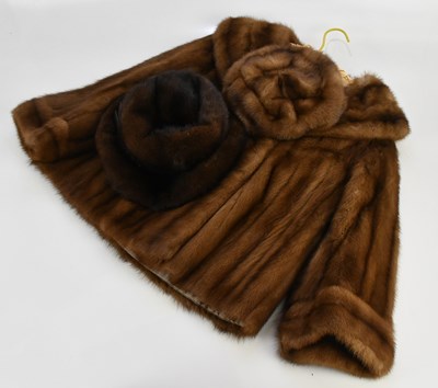 Lot 1351 - A light tan short mink coat with large collar,...