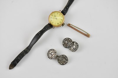 Lot 34 - A yellow metal bar brooch stamped 'Baby',...