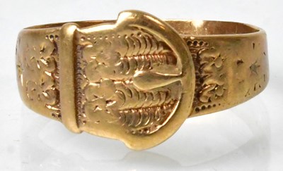 Lot 673 - A 9ct gold ring in the form of a belt and...