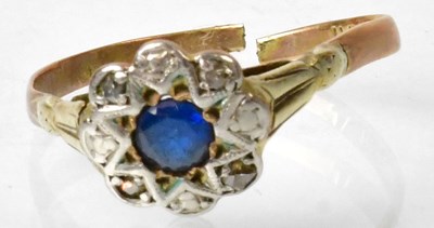 Lot 662 - A 9ct gold ring set with a topaz with diamond...