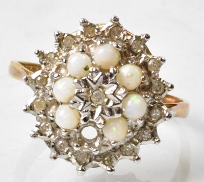 Lot 675 - A 9ct gold cluster ring illusion set with...