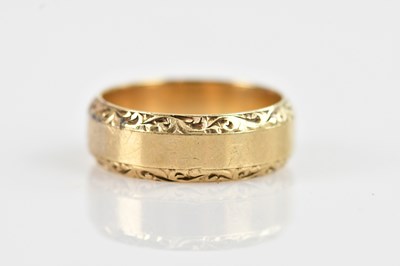 Lot 555 - A 9ct yellow gold wedding band, size S, approx...