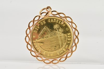 Lot 364 - A Rio de Janeiro medallion, tests as 17kt gold...