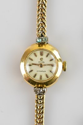 Lot 1035 - CYMA; a lady's Cymaflex 18ct gold cased...