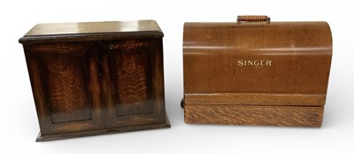 Lot 326 - A 1920s oak tabletop smoker's cabinet, with...