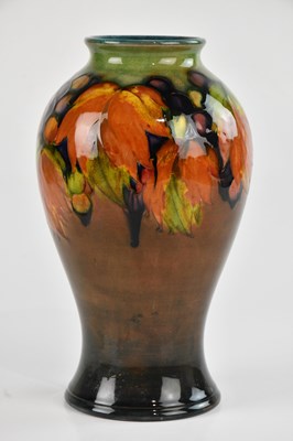 Lot 17 - WILLIAM MOORCROFT; an inverted baluster shaped...